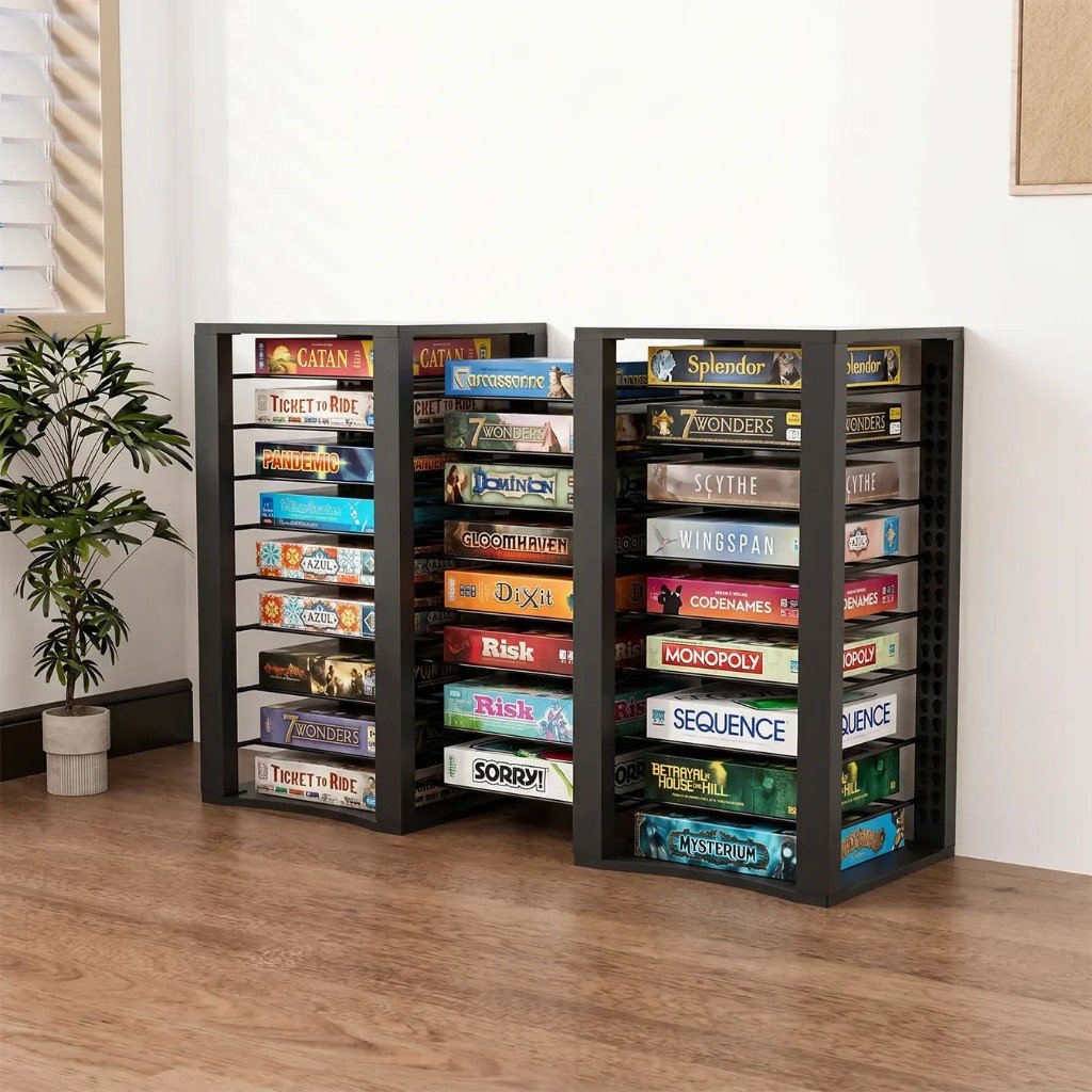Two BoardForge racks filled with board games in a bright room